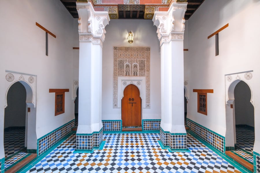 Inside the Medresa Ben Youssef courtyard and doorway