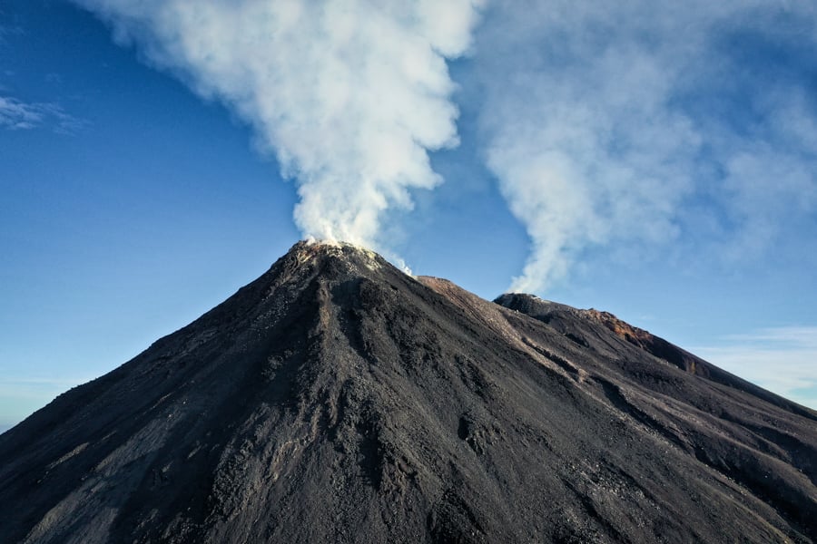 Mount Karangetang Volcano Smoking Twin Craters In Siau Island Sulawesi Indonesia Drone