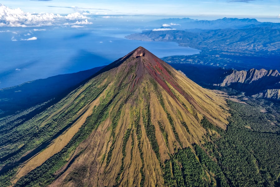 Drone view of Mount Inerie volcano and the surrounding coastline in Flores island