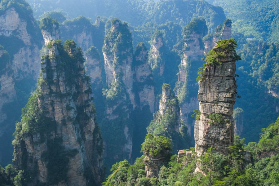 Stone pillars at Yellow Stone Village Huangshi in Zhangjiajie National Forest Park China