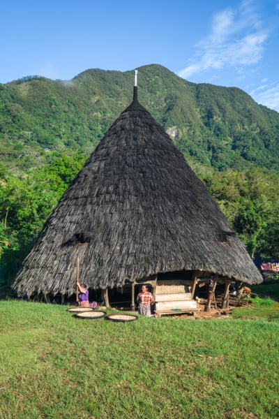 Morning view of a hut with mountains in the background