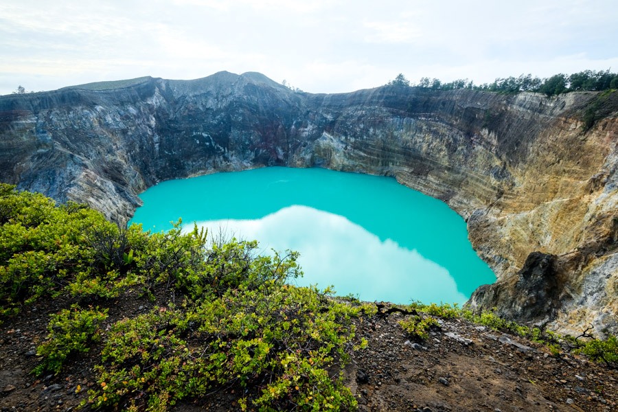 Blue crater lake at Kelimutu turquoise lake in Flores Indonesia