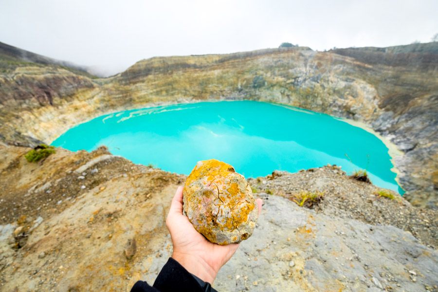 Orange and blue crater lake in Flores Indonesia