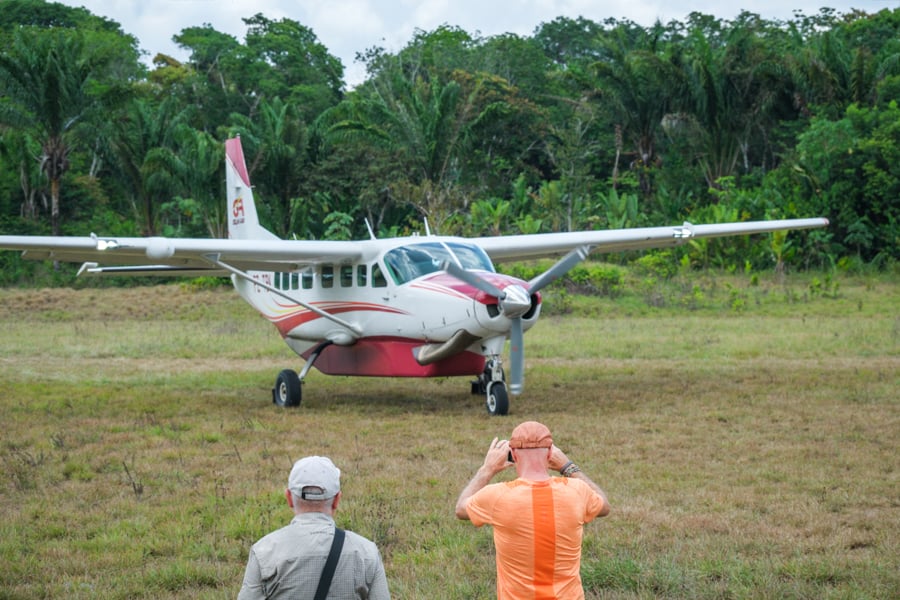 Bush plane landing at the Palumeu airstrip