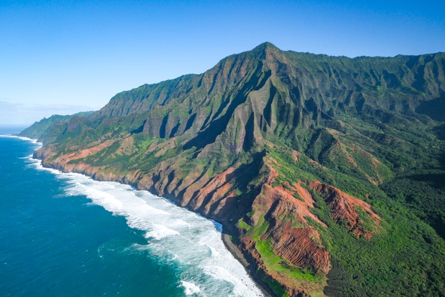 Doors off helicopter view of the Na Pali coast in Kauai Hawaii