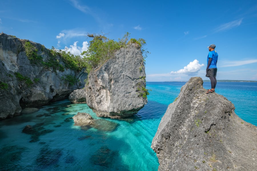 Standing at the Batu Buti rock