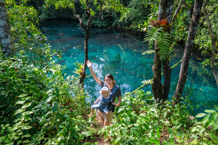 Tourist with a baby at the third Moko lake in Muna