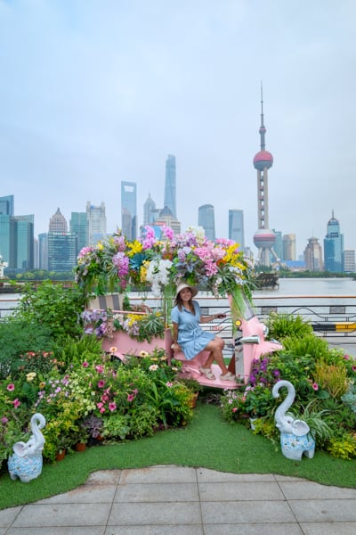 Posing at the North Bund with flowers